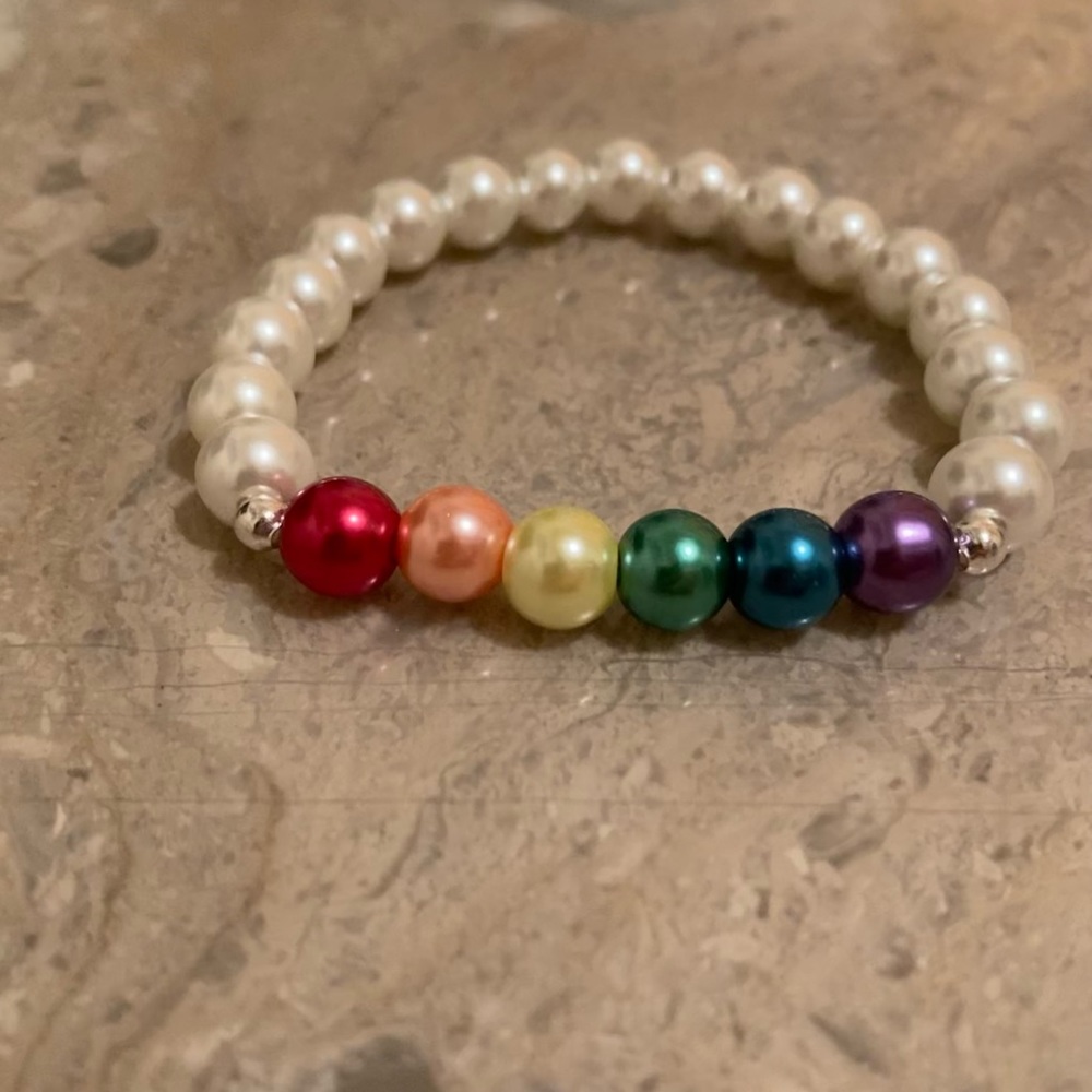 Stretch white rainbow glass pearl (8mm)bead bracelet. 6 1/2” wrist.